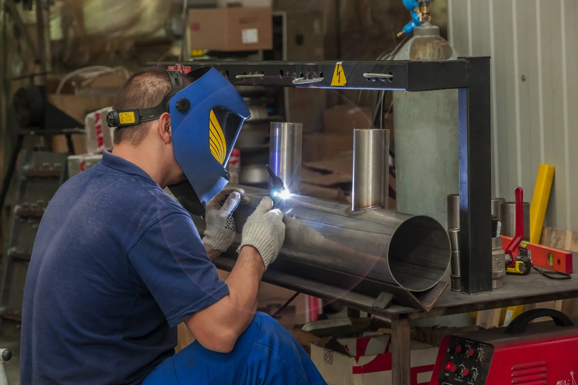 Welder welding stainless steel