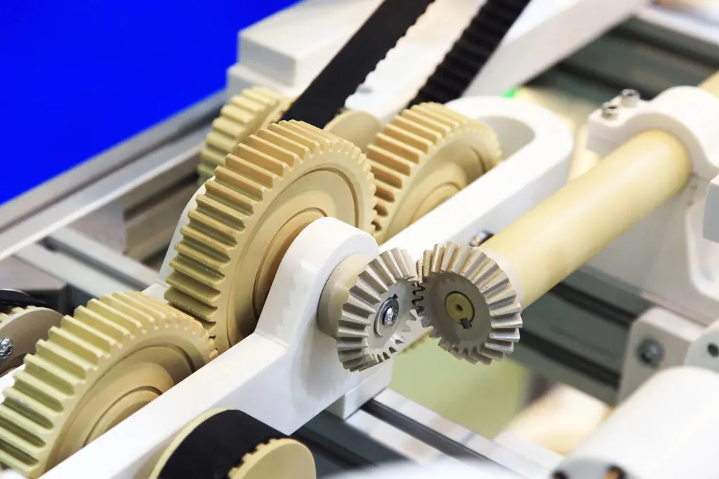 UHMW plastic components used as wear strips, guides, and liners in high-abrasion environments