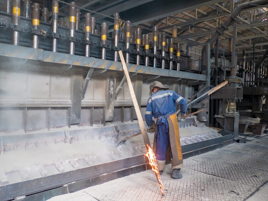 Worker anodizing aluminum